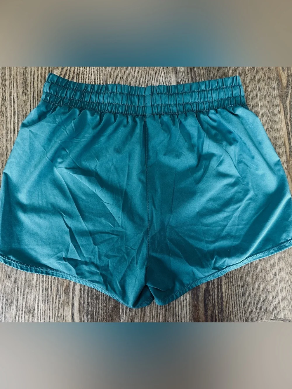 Nike Girl’s Dark Teal Running Shorts with Nike Swoosh